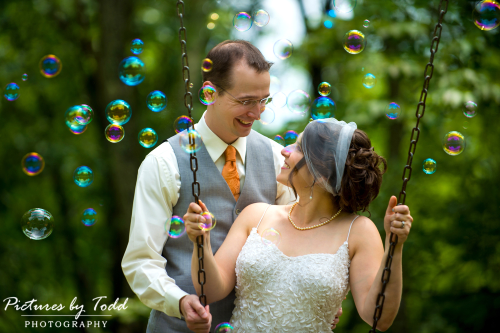 bride-and-groom-bubbles-swingset-park-wedding