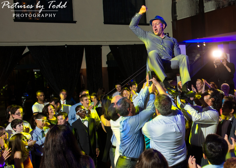 dad-on-chair-bar-mitzvah-pictures-by-todd-photography
