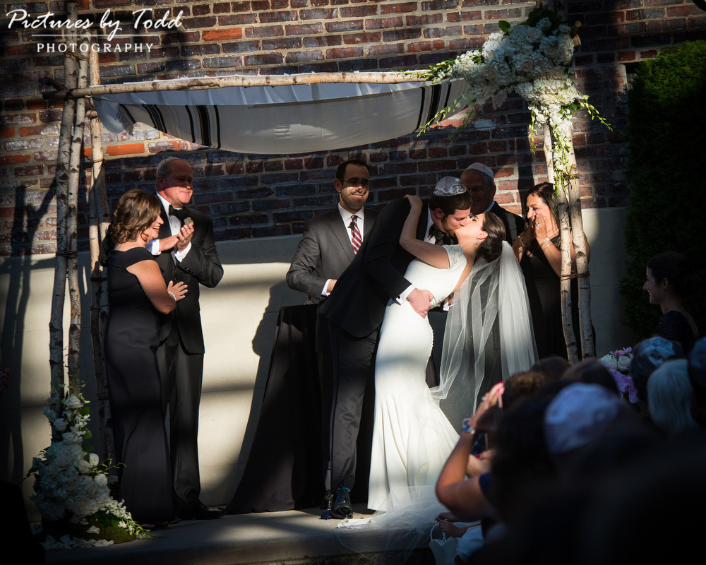 bride-groom-kiss-ceremony-vie-venue-passionate