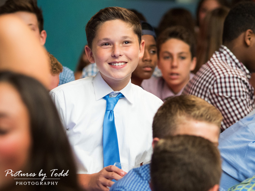 moulin-at-sherman-mills-bnai-mitzvah-smile-candid-moment-blue-tie-friends