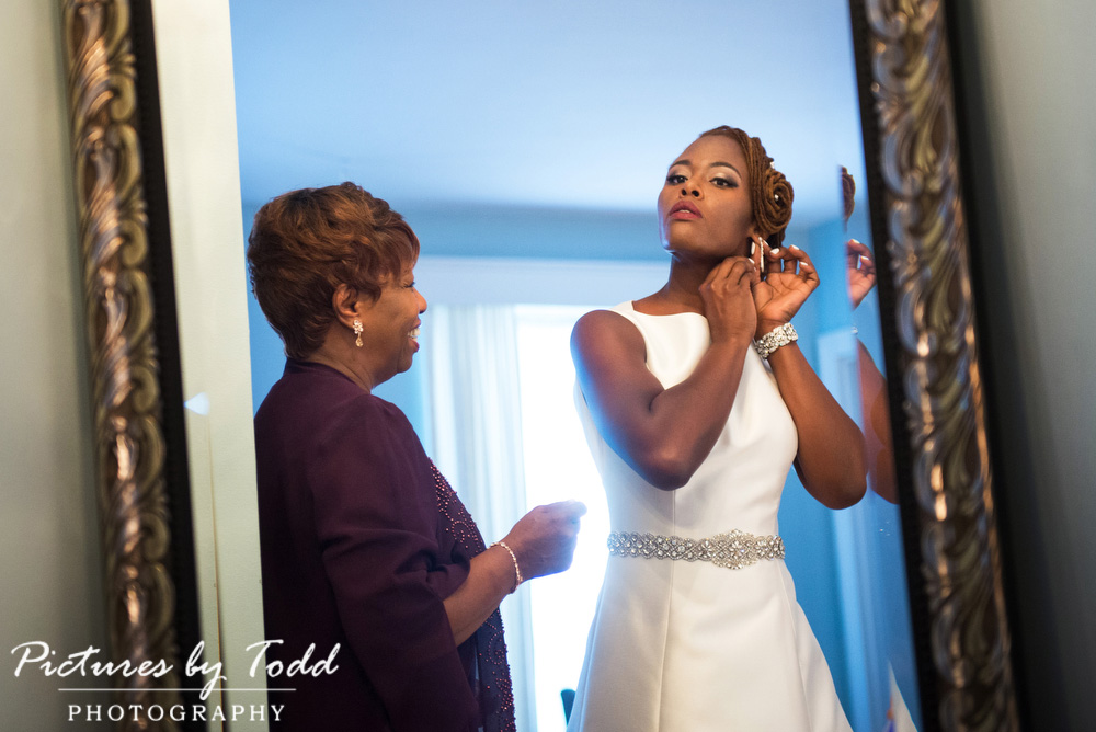 getting-ready-bride-mother-mirror-beautiful-sophisticated