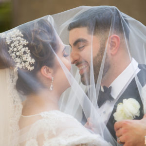 newlyweds under veil