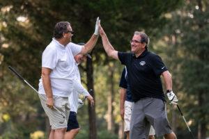 high five at golf outing
